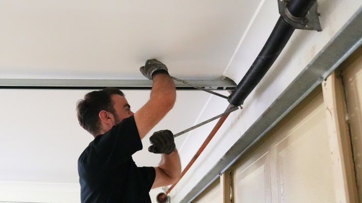 How a Fresh Garage Door Spring Replacement Boosts Your Home’s Resale Value